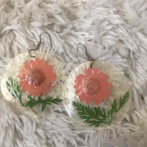 Earrings with real flower inside